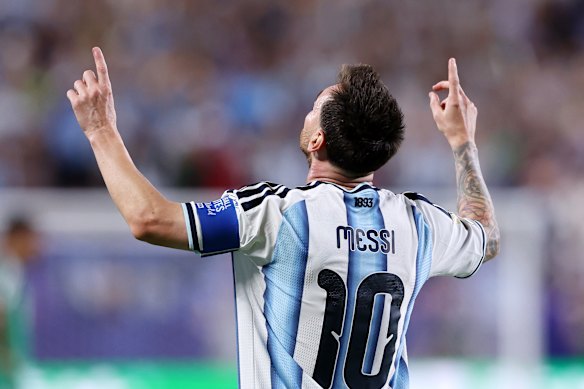 Lionel Messi celebrates scoring his second goal against Algeria. 