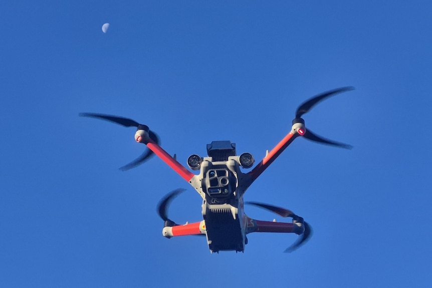 Phone of drone with four cameras in blue sky