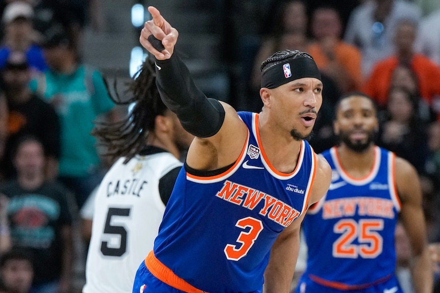 New York Knicks guard Josh Hart celebrates a basket against the San Antonio Spurs.