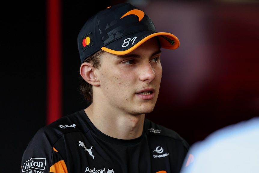 Oscar Piastri speaks while being interviewed at the Monaco Grand Prix.