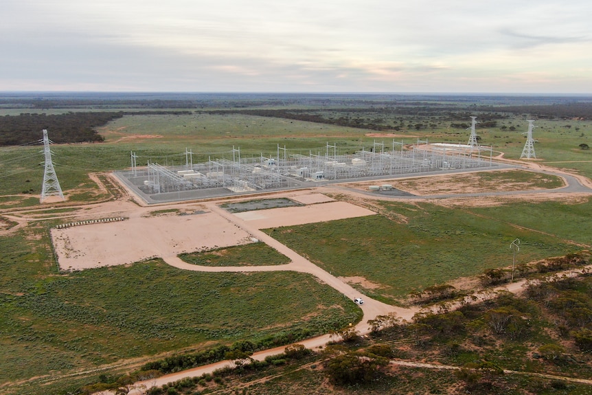 A large substation featuring numerous electricity towers and power lines in regional South Australia.