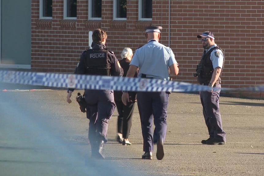 police officers investigate a public place shooting at punchbowl