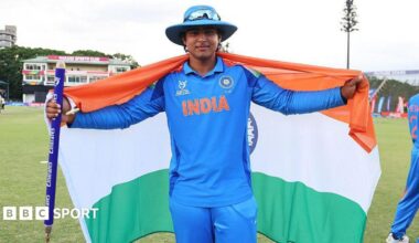 Vaibhav Sooryavanshi holds up an India flag to celebrate winning the Under-19 World Cup