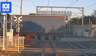 Truck was stuck at rail crossing for almost five minutes before train strike, report finds