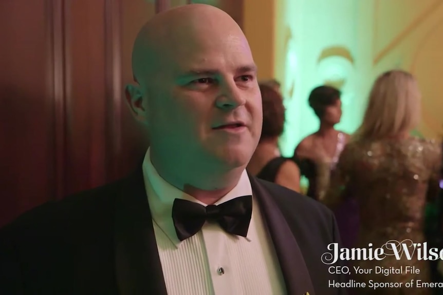 Jamie Wilson in a tuxedo.