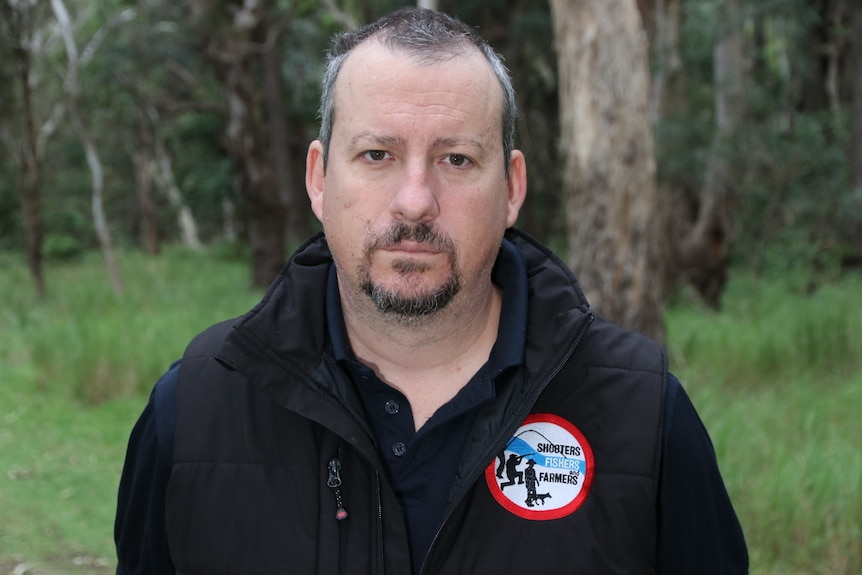 mark banasiak standing in bushland