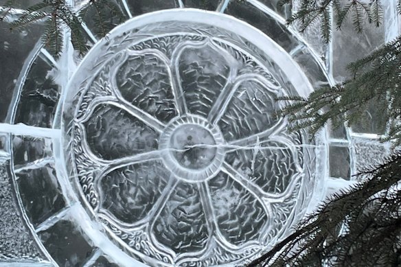 An ornate ‘window’ carved by Melbourne artist Kevin Kapusi Starow in 2025 at the World Ice Art Championships  in Fairbanks, Alaska.
