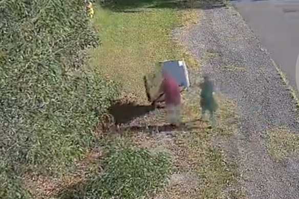 CCTV images of a couple allegedly dumping a fridge in Brisbane. 