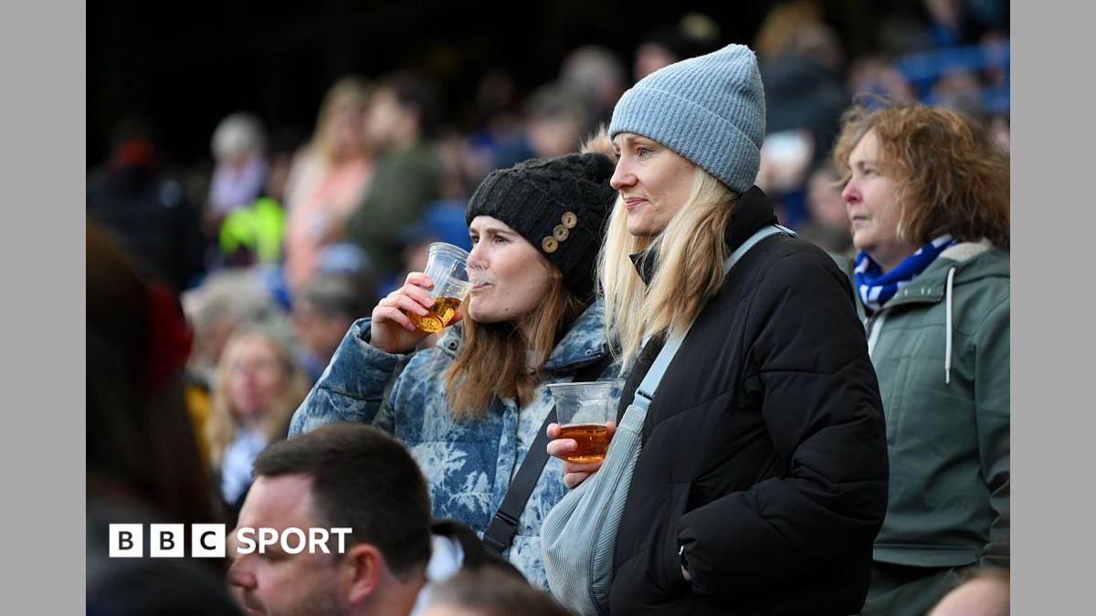 WSL fans drinking in the stands