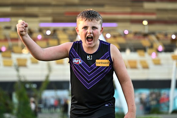 A young Dockers fan fires up ahead of the clash with Geelong.