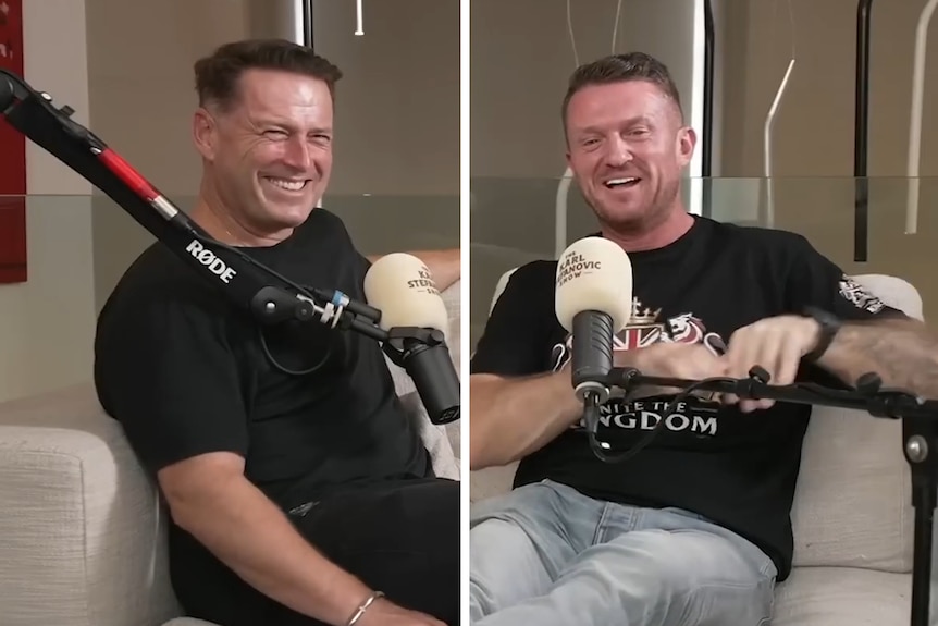 Two men sit in an interview setting.
