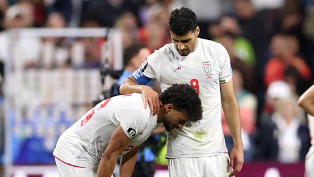 Players react after their draw to Egypt.
