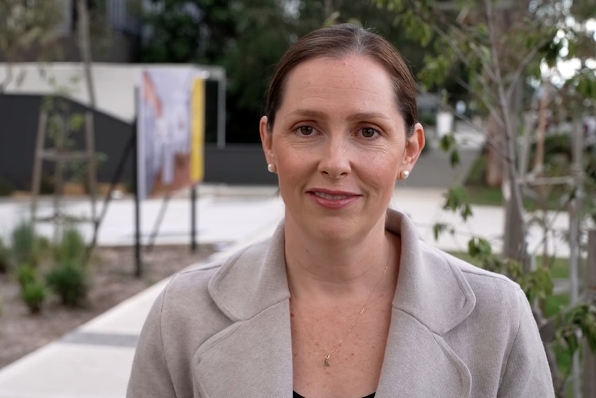 Katie Stevenson form the Property Council australia stands outdoors looking at the camera