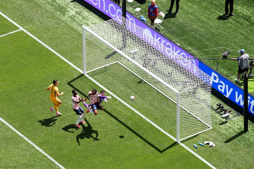 Alex Freeman scores for USA.