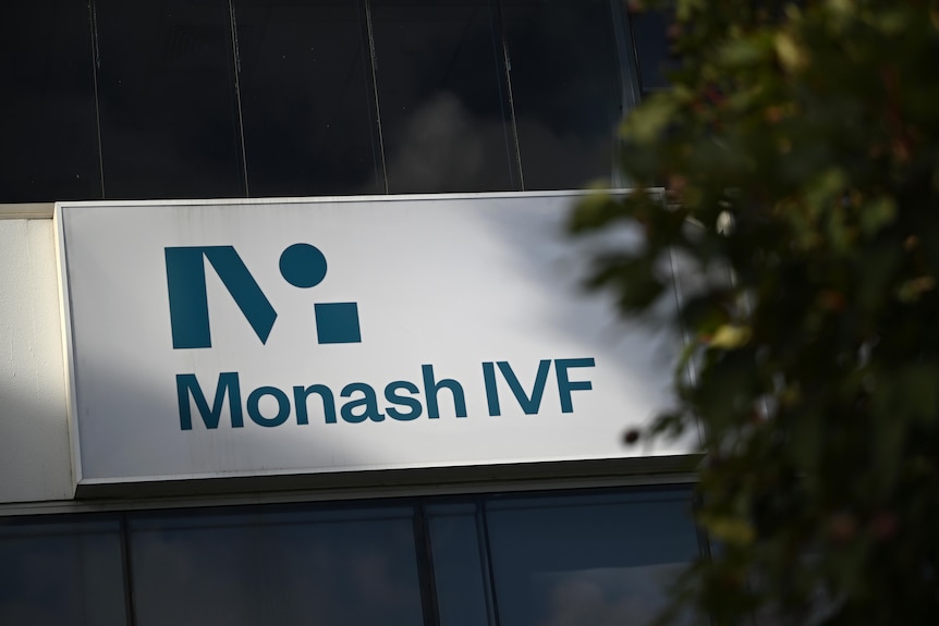 A white sign on a building reading "Monash IVF"