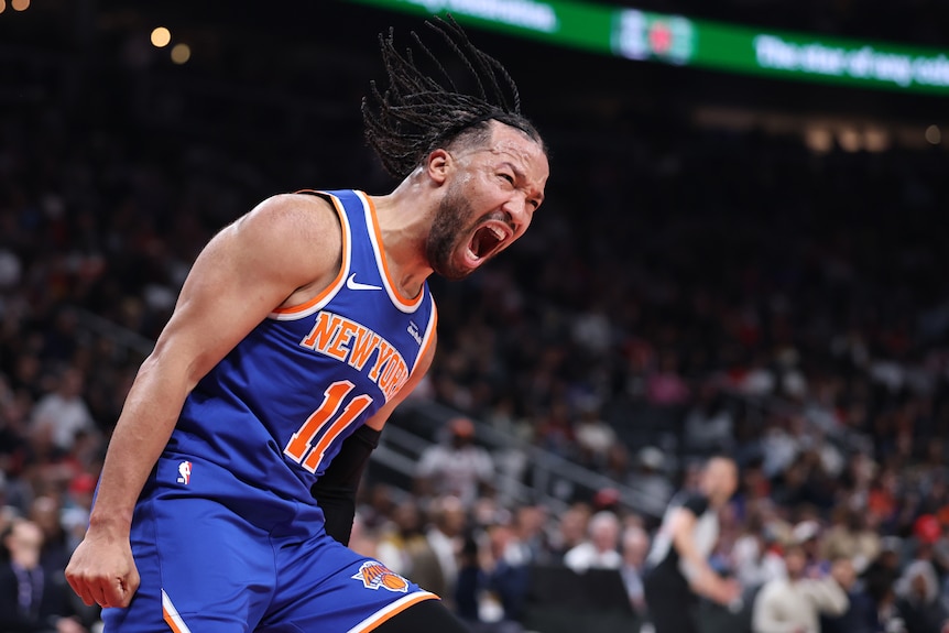 Jalen Brunson roars in celebration after a basket