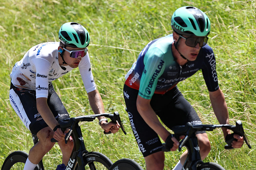 Decathlon CMA CGM Team's French rider Paul Seixas wearing the best young rider's white jersey cycles during the 7th stage of the Tour Auvergne-Rhone-Alpes cycling race (formerly known as the Criterium du Dauphine), 133,6km between La Bridoire and Grand Colombier in the French Alps on June 13, 2026. (Photo by Anne-Christine POUJOULAT / AFP)