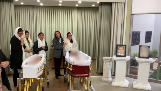 Family and friends have gathered to farewell Maulik Dhandhukia and his daughter.