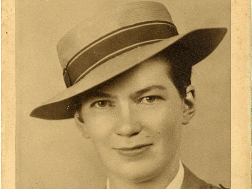 Historic headshot of woman in military hat