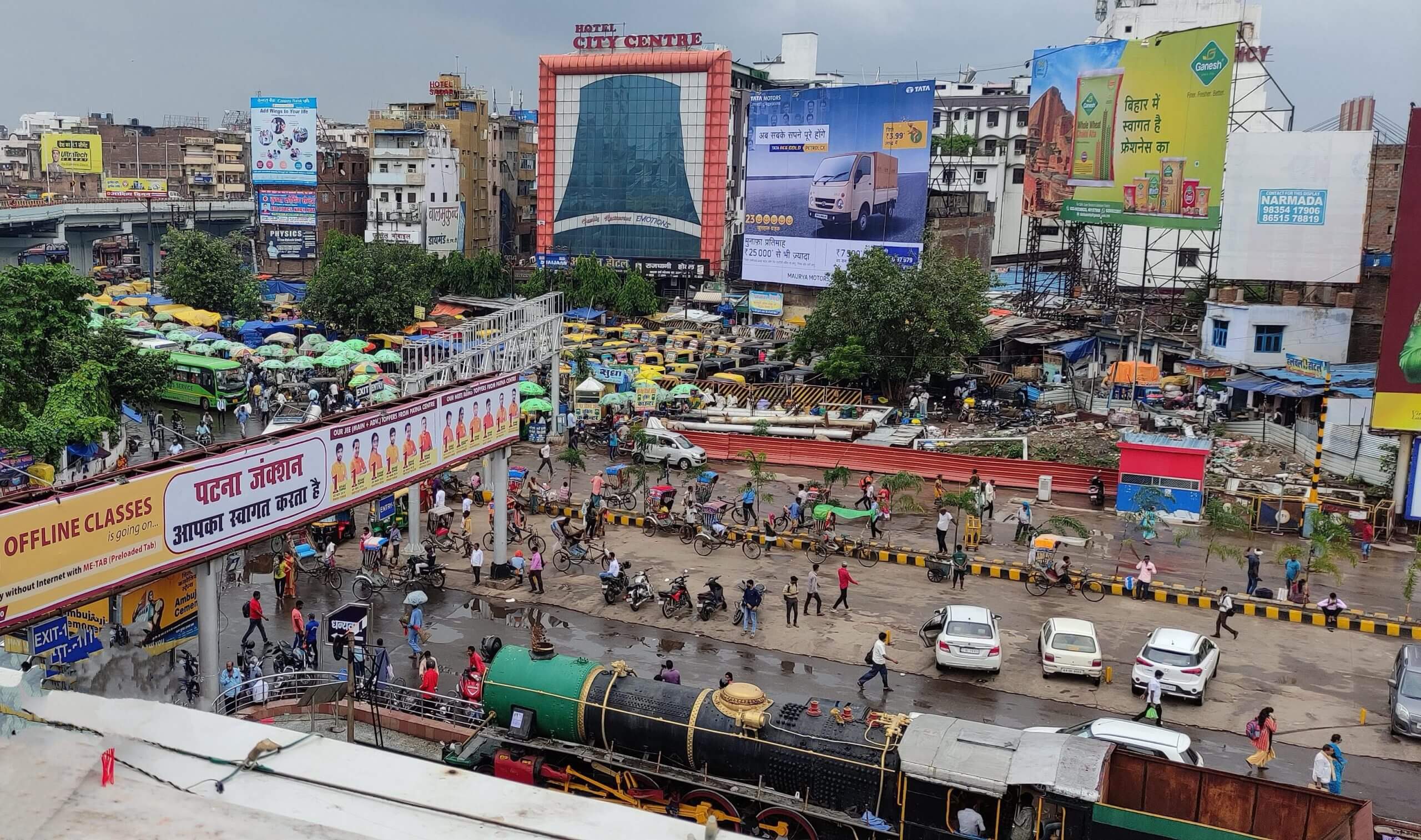 A view of trains and pedestrians in Patna, the centre of Bihar's capital city