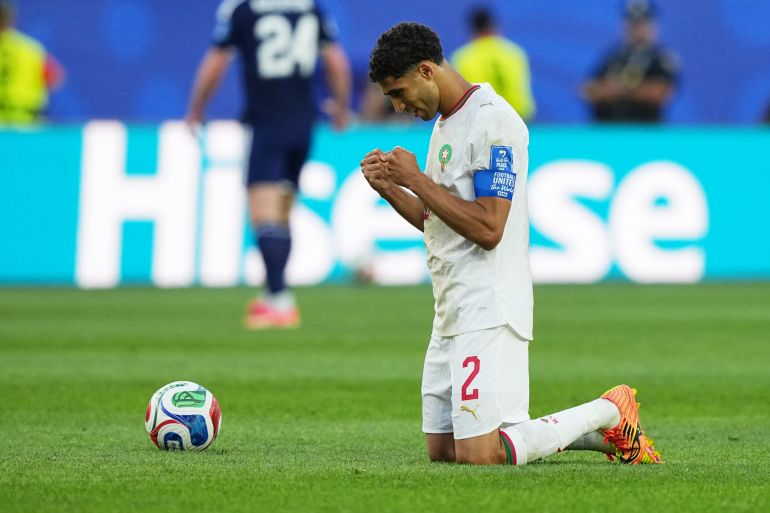 Morocco's Achraf Hakimi celebrates at the end of the World Cup Group C soccer match between Scotland and Morocco in Foxborough, Mass., near Boston, Friday, June 19, 2026. (AP Photo/Martin Meissner)