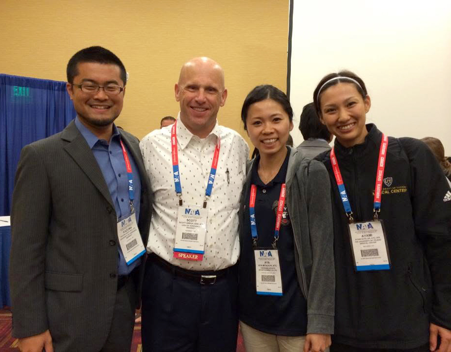 Ayami Sato with UNK faculty members Kazuma Akehi and Scott Unruh.