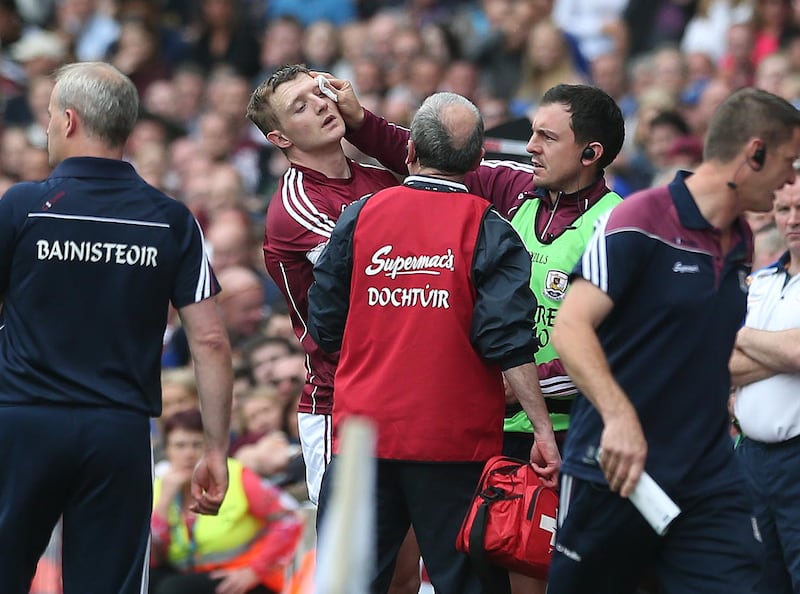 Galway's Joe Canning receives treatment after a 'perfect' challenge by Padraic Maher of Tipperary during the 2016 All-Ireland semi-final. Photograph: Lorraine O'Sullivan/Inpho