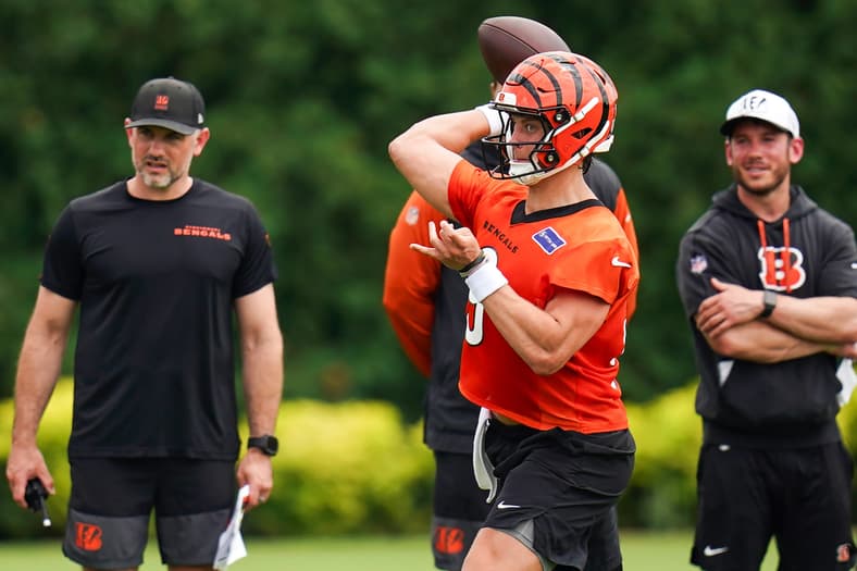 Cincinnati Bengals quarterback Joe Burrow (9) throws a pass to a teammate during practice on Tuesday, June 9, 2026, at Kettering
