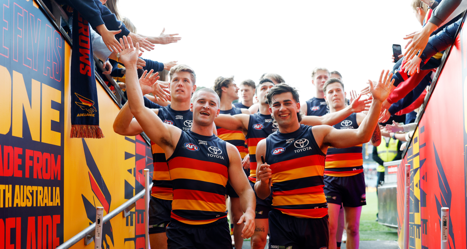 AFL Match Report: Crows edge past Demons in high-pressure battle