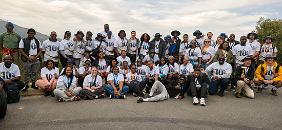 A group photo of about 50 young surveyors