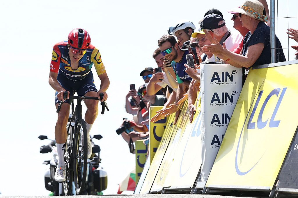 Lidl-Trek's Spanish rider Juan Ayuso cycles to the finish line of the 7th stage of the Tour Auvergne-Rhone-Alpes cycling race (formerly known as the Criterium du Dauphine), 133,6km between La Bridoire and Grand Colombier in the French Alps on June 13, 2026. (Photo by Anne-Christine POUJOULAT / AFP)