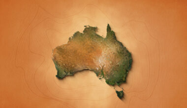 The video showcases an animation of a realistic map of Australia set against a brown vintage paper background. It utilizes a zooming effect, allowing viewers to closely examine the continent, revealing its geographical features and details.