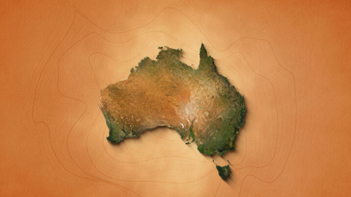 The video showcases an animation of a realistic map of Australia set against a brown vintage paper background. It utilizes a zooming effect, allowing viewers to closely examine the continent, revealing its geographical features and details.