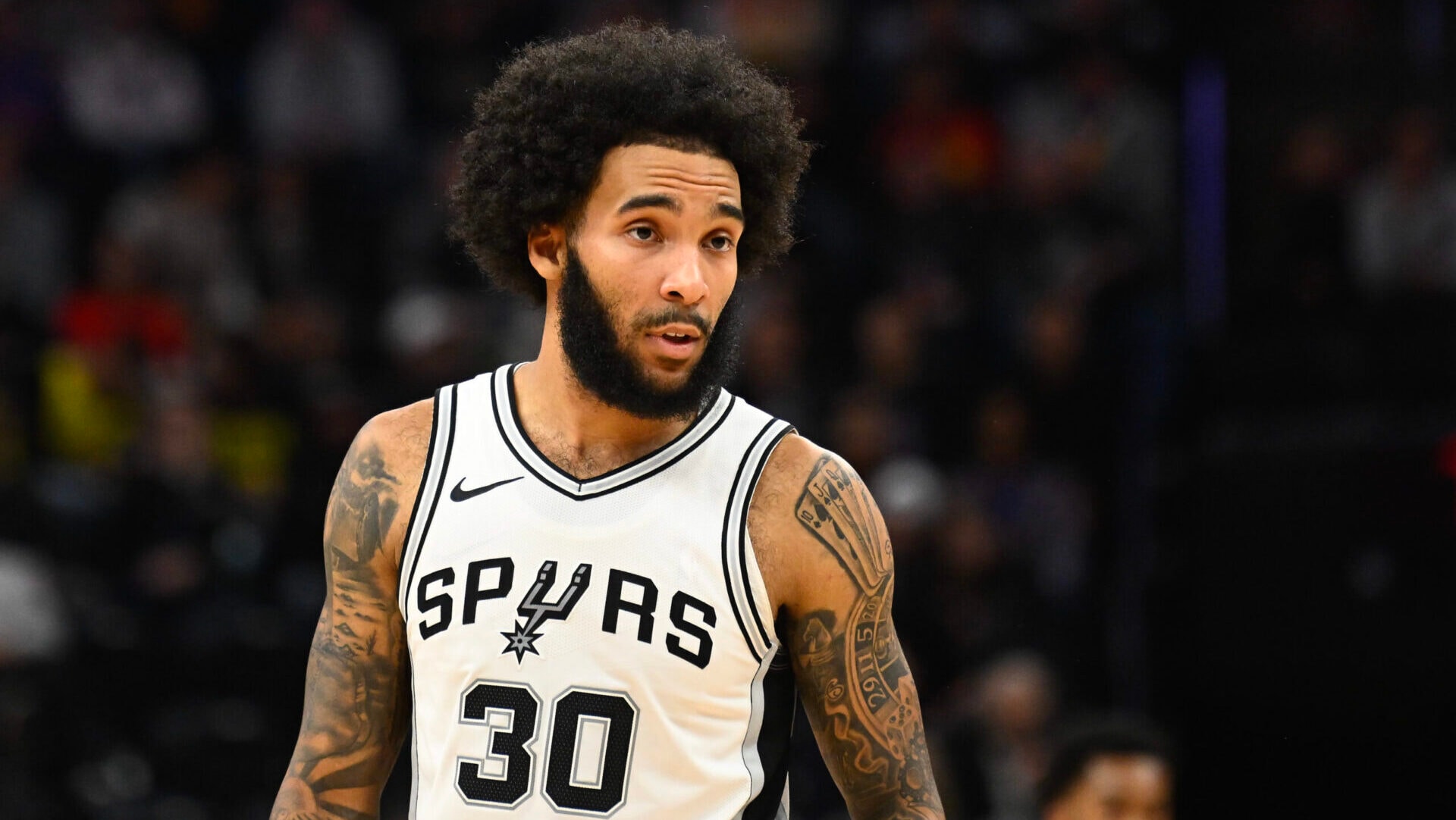 Julian Champagnie #30 of the San Antonio Spurs looks on during the first half of a game against the Utah Jazzat Delta Center on October 31, 2024 in Salt Lake City, Utah.