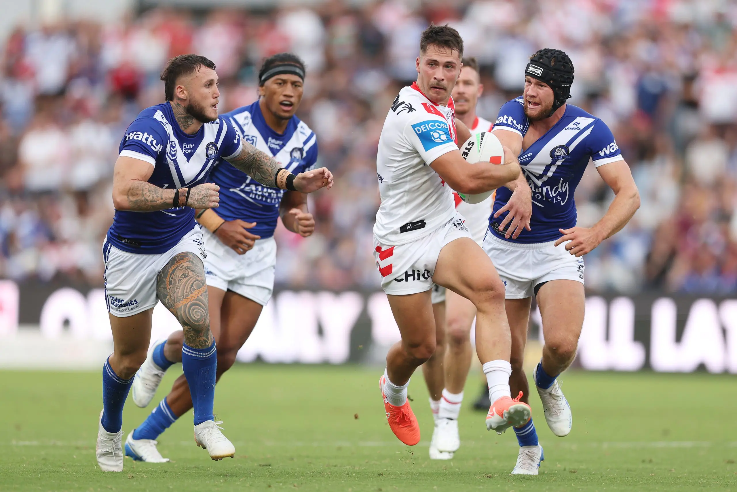SYDNEY, AUSTRALIA - MARCH 08: Lachlan Ilias of the Dragons makes a break during the round one NRL match between St George Illawarra Dragons and Canterbury Bulldogs at Netstrata Jubilee Stadium, on March 08, 2025, in Sydney, Australia. (Photo by Mark Metcalfe/Getty Images)
