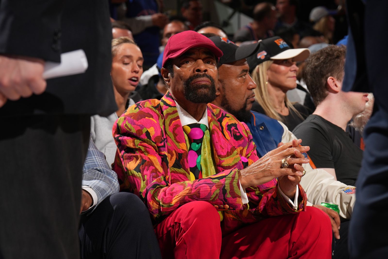 Image may contain Walt Frazier Ken Stabler Adult Person People Face Head Baseball Cap Cap Clothing and Hat