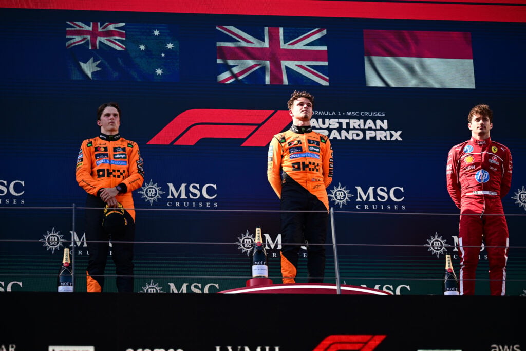 Lando Norris and Oscar Piastri of McLaren and Charles Leclerc of Ferrari on the 2025 Austrian Grand Prix podium