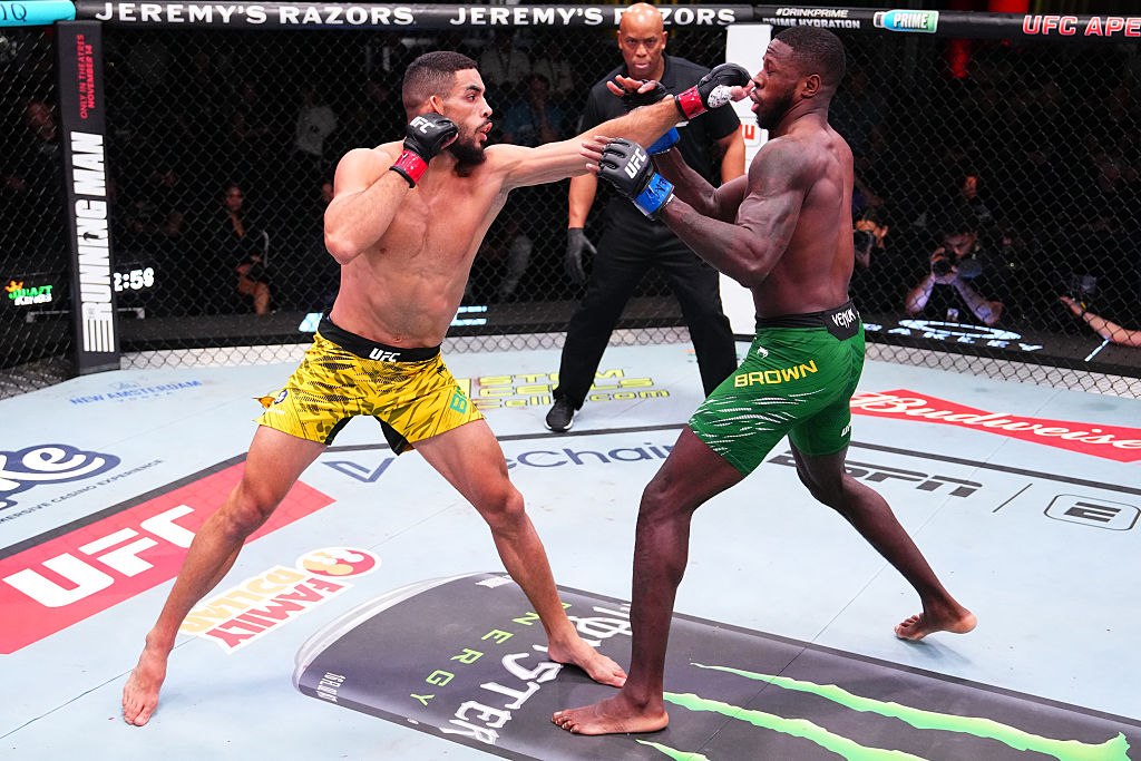 LAS VEGAS, NEVADA - NOVEMBER 08: (L-R) Gabriel Bonfim of Brazil punches Randy Brown of Jamaica in a welterweight fight during the UFC Fight Night event at UFC APEX on November 08, 2025 in Las Vegas, Nevada. (Photo by Jeff Bottari/Zuffa LLC)