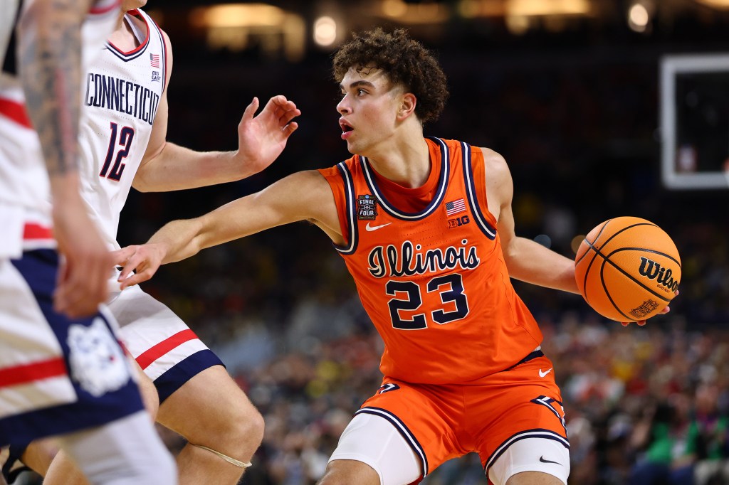 Keaton Wagler #23 of the Illinois Fighting Illini controls the ball against the Connecticut Huskies in the Final Four of the 2026 NCAA Men's Basketball Tournament at Lucas Oil Stadium on April 04, 2026 in Indianapolis, Indiana. 