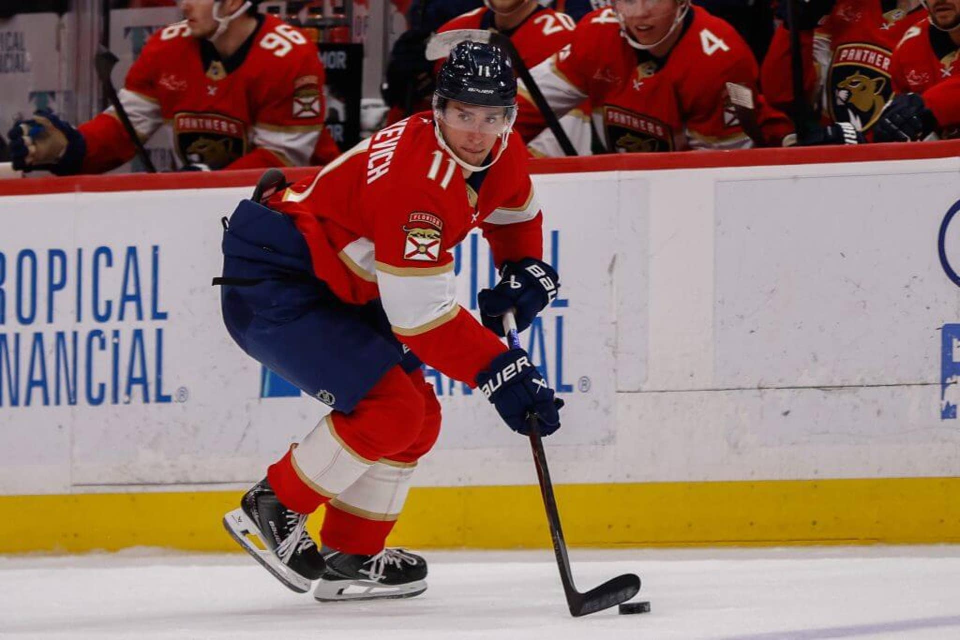 Florida Panthers right wing Mackie Samoskevich skates with a hockey puck on his stick during a game.