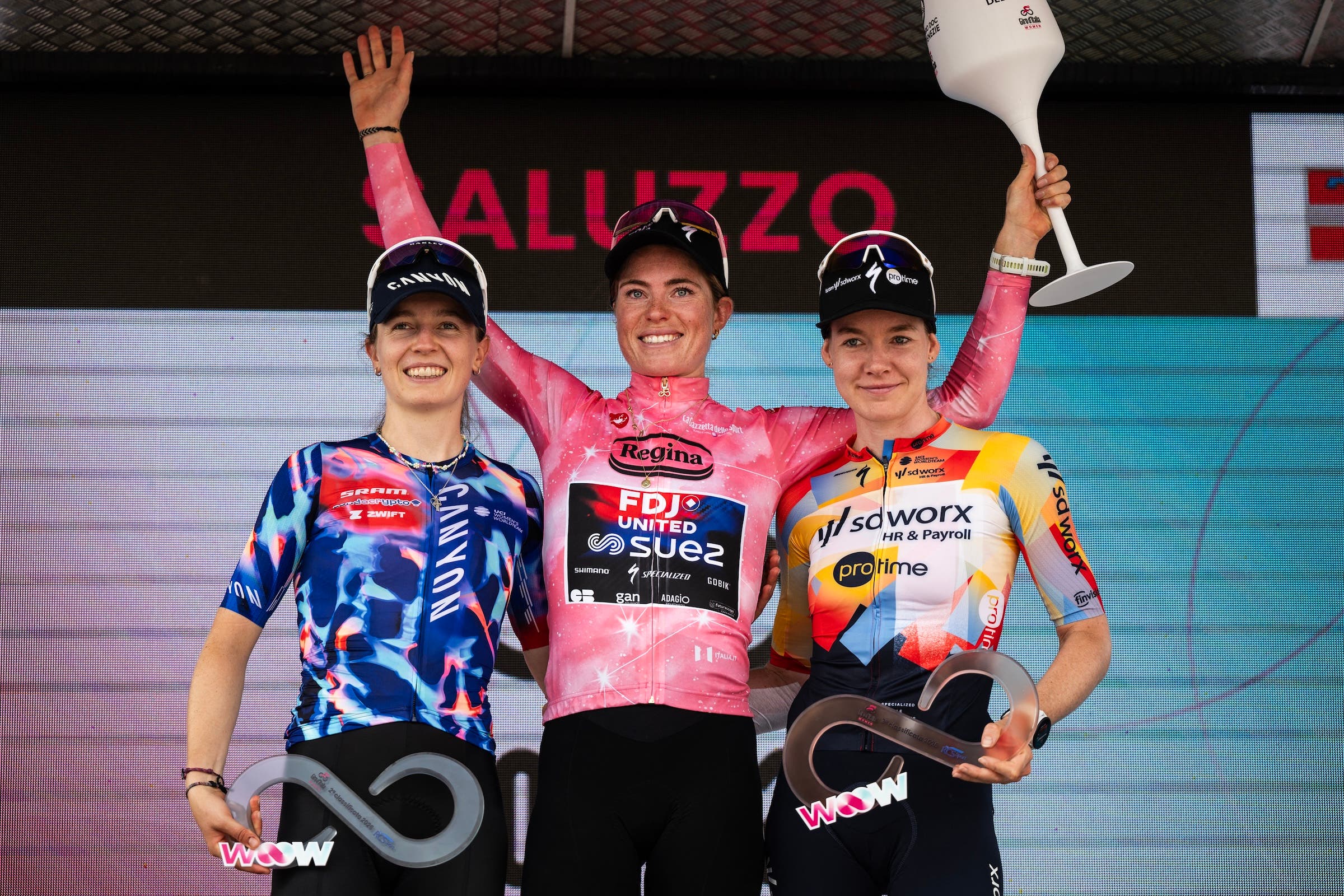 Demi Vollering (C) won the overall at the Giro d'Italia Women, and is likely the highest earner in women's cycling (Photo: Marco Bertorello / AFP)