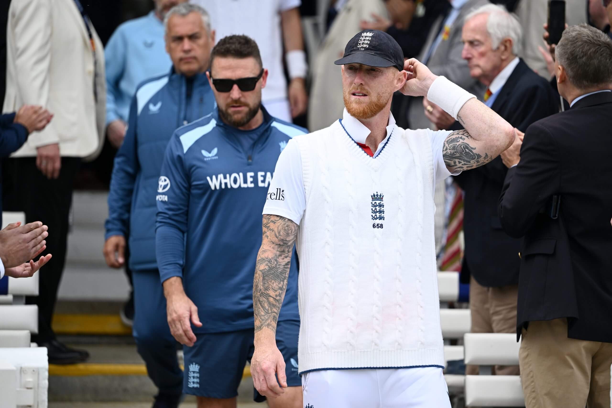 Brendon McCullum follows Ben Stokes down the steps at the end of the first Test at Lord's