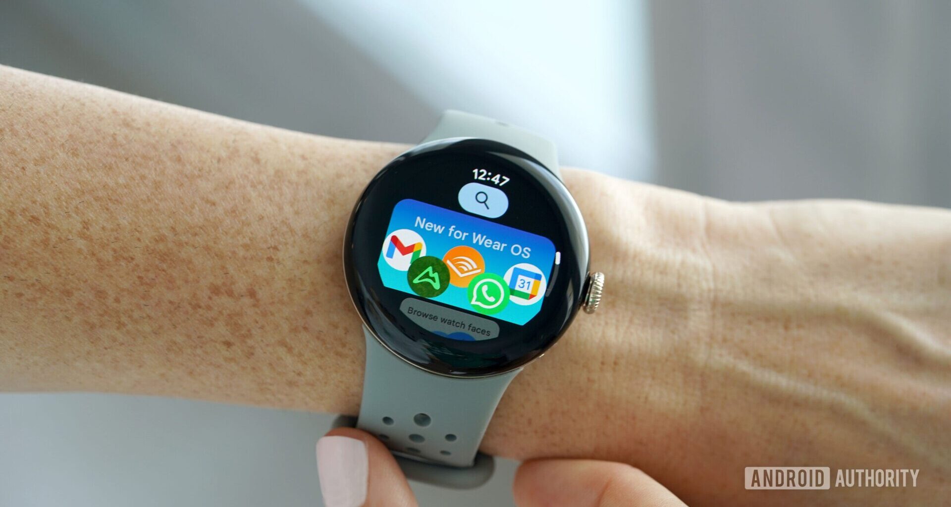 A Google Pixel Watch 2 displays the Google Play Store.
