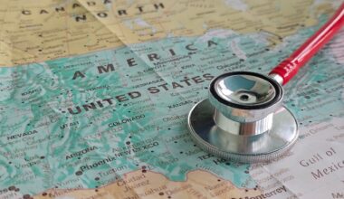 A stethoscope rests on a map of the United States, symbolizing the intersection of healthcare and geographical regions