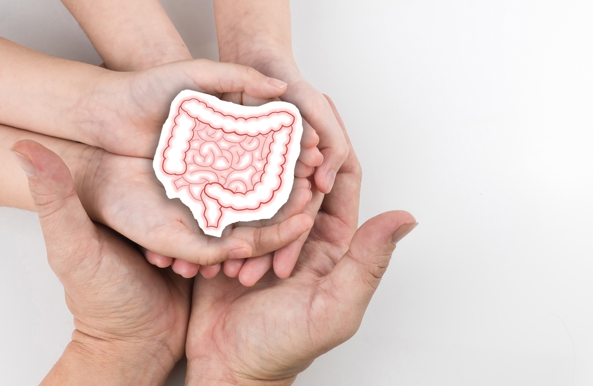 Healthy large intestine holding hand adult and child family. Concept of intestinal disease treatment or colorectal cancer awareness.