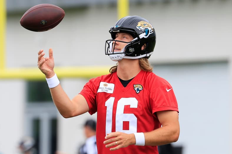 Jacksonville Jaguars quarterback Trevor Lawrence (16) tosses the ball during the first day of minicamp at the Miller Electric