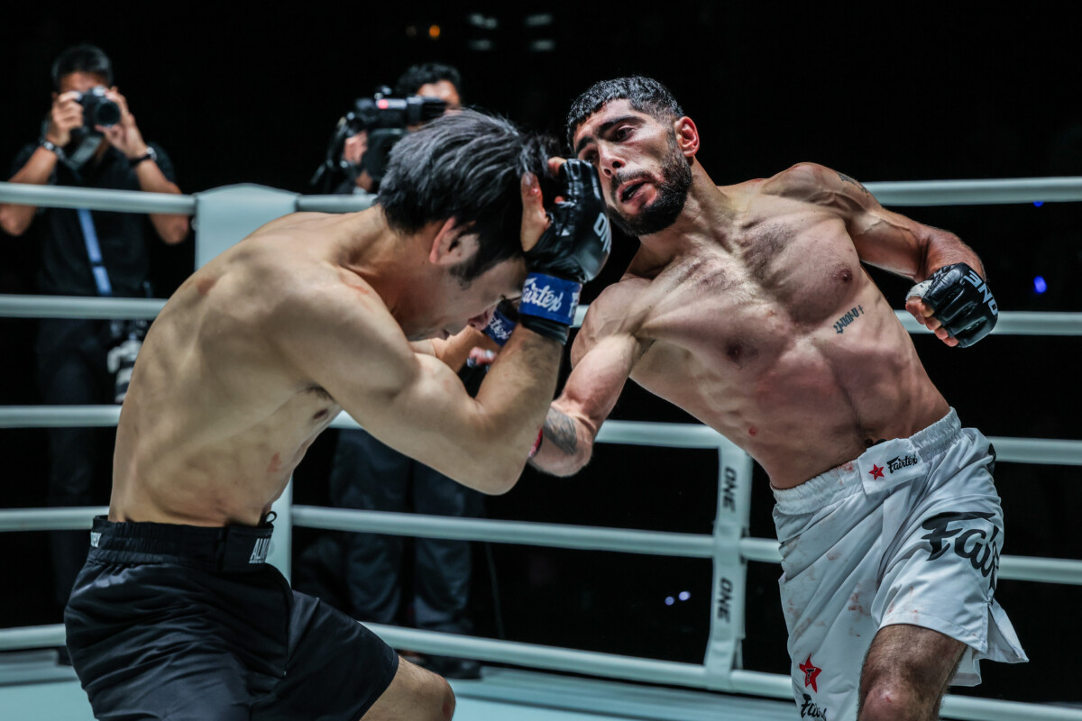 Armenian MMA fighter Karen Ghazaryan lands an uppercut on Hisashi Ezaki