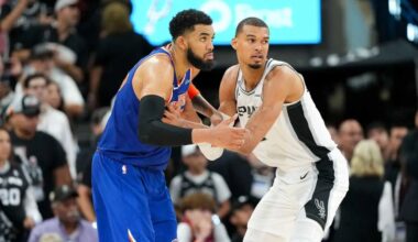 Jun 5, 2026; San Antonio, Texas, USA; New York Knicks center Karl-Anthony Towns (32) and San Antonio Spurs forward Victor Wembanyama (1) look for the ball in the second half during game two of the 2026 NBA Finals at Frost Bank Center. Mandatory Credit: Scott Wachter-Imagn Images