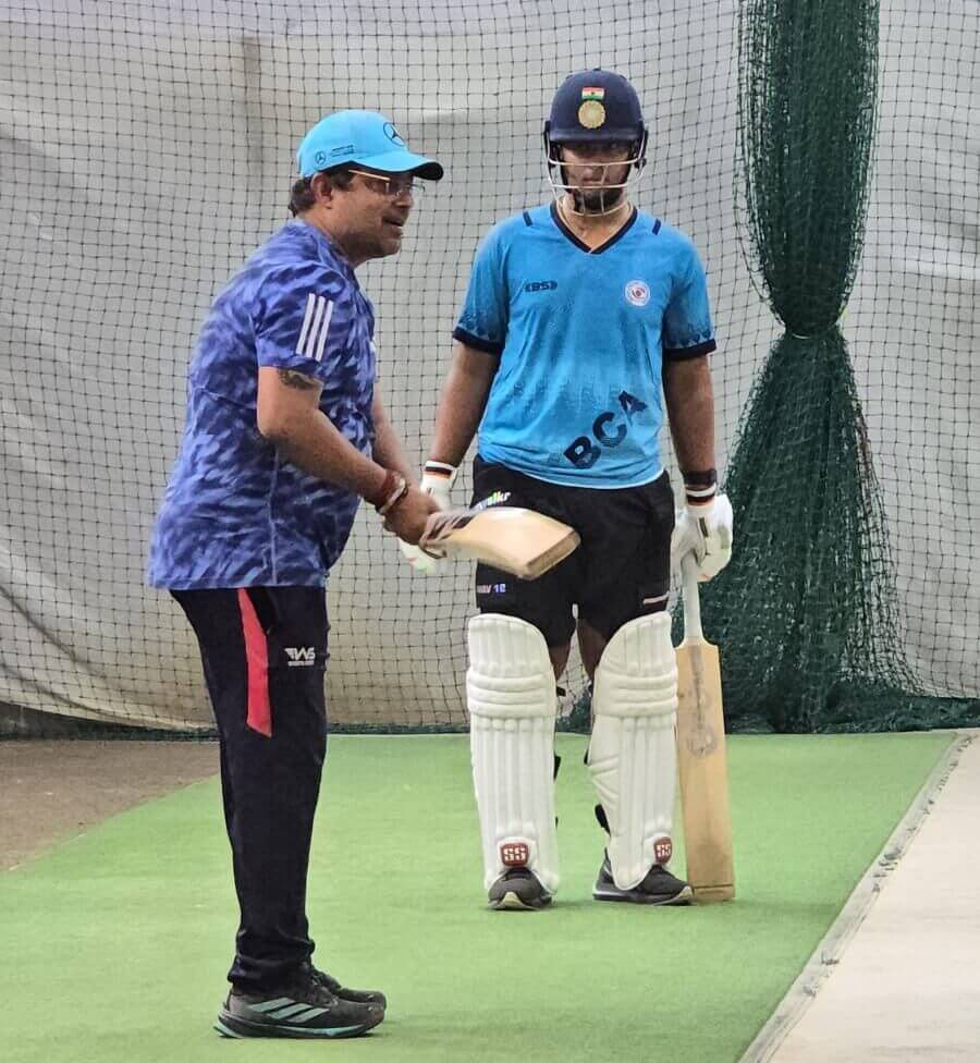 Manish Ojha demonstrates a batting drill to Vaibhav Sooryavanshi in his Patna academy