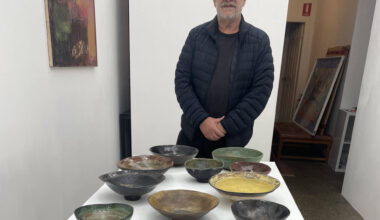 Between worlds, between kilns - Neos Kosmos